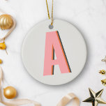 Pink and Orange Retro Typography Monogram Initial Ceramic Ornament<br><div class="desc">Add a bold, vintage touch to your Christmas decor with this personalised monogram ceramic ornament, featuring a vibrant pink and orange retro typography design. Perfect for those who love a playful and nostalgic aesthetic, this ornament can be customised with your initials, making it a one-of-a-kind keepsake or a thoughtful holiday...</div>