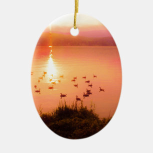 Pink and peach lake sunset ceramic ornament