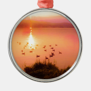 Pink and peach lake sunset metal ornament
