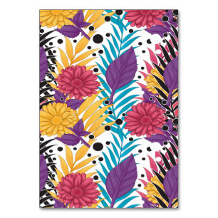 Pink and purple cut flowers with intricate petals table number
