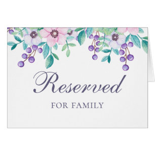 Pink and purple flowers. Wedding reserved sign