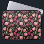 Pink and Red Floral Tulip Laptop Sleeve<br><div class="desc">This fabric laptop bag features a design with vibrant pink and red tulip flowers against a dark black background. The lush green tulip leaves add contrast, bringing a fresh pop of colour to the dark background. This bold floral pattern exudes elegance and sophistication and is perfect for anyone who loves...</div>