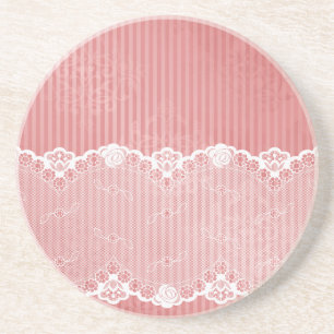 Pink and white background with black lace coaster