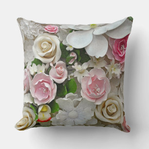Pink and white floral print cushion