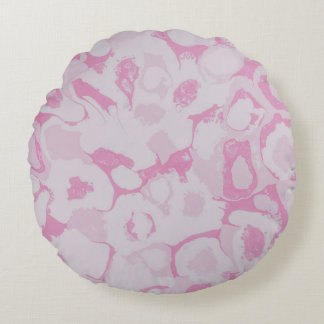 Pink and white floral textile round cushion