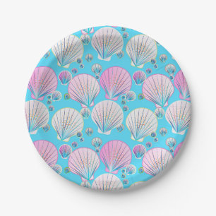 Pink and white sea shells on turquoise paper plate