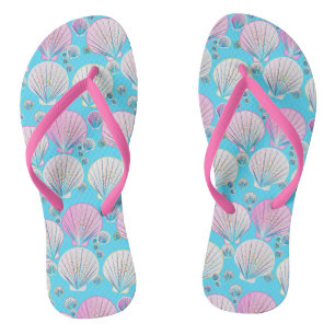 Pink and white sea shells on turquoise thongs