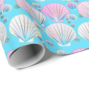 Pink and white sea shells on turquoise wrapping paper