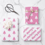 Pink and white trees Merry Christmas holiday Wrapping Paper Sheet<br><div class="desc">Pink and white trees Merry Christmas holiday Wrapping Paper Sheets. The first sheet features a Christmas trees in pink on white,  the second white on pink and the third the text "Merry Christmas" in pink on white.</div>