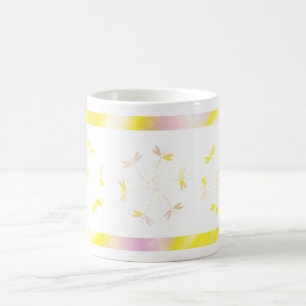 Pink and yellow mug with dragonflies
