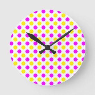 Pink and yellow polka dots round clock