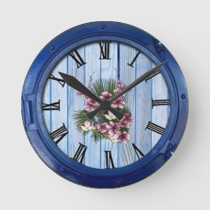 Pink Arty Flowers on Blue-wood texture Round Clock