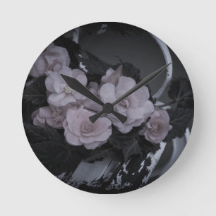 Pink Begonias Resting On Bench Round Clock