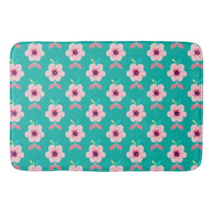 Pink Blossoms and Leaves on Teal Background Bath Mat