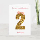 Pink Bow and Gold Glitter 2nd Birthday Card<br><div class="desc">A pretty 2nd birthday card featuring a gold glitter number two with a pink bow. Please note there is not actual glitter, but a glitter design effect. You will be able to easily personalise the front with the recipient and the birthday girl's name in a soft pink colour. There is...</div>