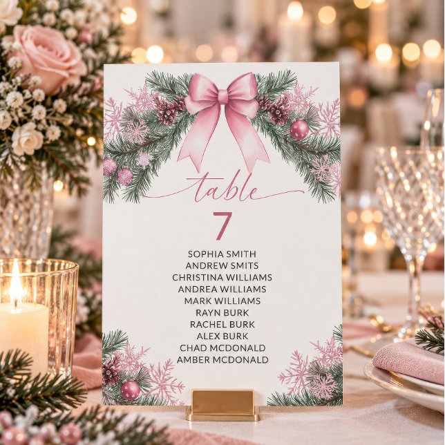Pink Bow Christmas Table Number Seating Chart (Pink Bow Winter Table Number Seating Card, pine branches, pink snowflakes, guest names)