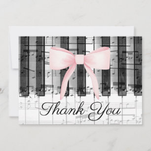 pink bow thank you calligraphy on music piano card