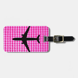 Pink bubblegum texture pattern with aeroplane luggage tag