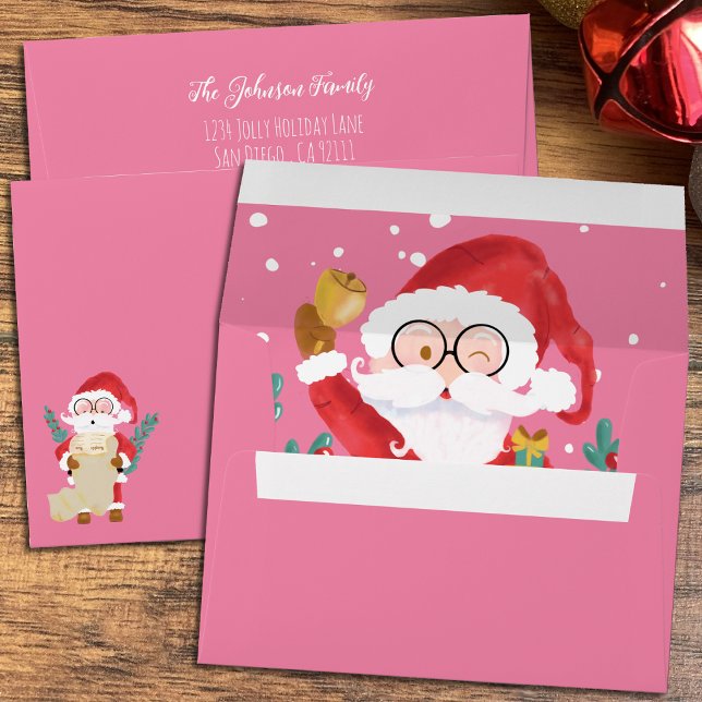 Pink Christmas Envelope with Whimsical Santa Claus (Fun Christmas pink envelopes with a whimsical Santa Claus .)