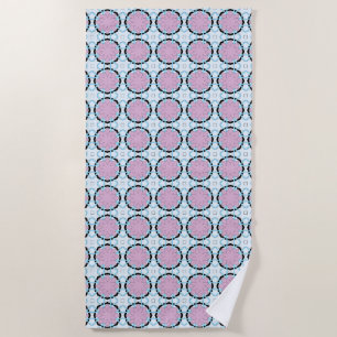 Pink circular geometric patterned beach towel