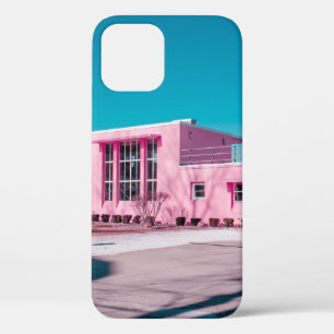 Pink concrete building under clear blue sky iPhone 12 case
