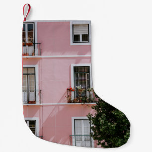 PINK CONCRETE COMMERCIAL BUILDING NEAR GREEN TREE SMALL CHRISTMAS STOCKING