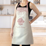 Pink Cupcake Glitter Drips Bakery Pastry Chef Gold Apron<br><div class="desc">Here’s a wonderful way to add to the fun of baking. Add extra sparkle to your culinary adventures whenever you wear this elegant, sophisticated, simple, and modern apron. A sparkly, rose gold cupcake, glitter drips, and dark grey handwritten typography overlay a faux metallic champagne gold ombre background. Personalise with your...</div>