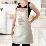 Pink Cupcake Glitter Drips Gold Bakery Pastry Chef Apron<br><div class="desc">Here’s a wonderful way to add to the fun of baking. Add extra sparkle to your culinary adventures whenever you wear this elegant, sophisticated, simple, and modern apron. A sparkly, rose gold cupcake, glitter drips, and dark grey handwritten typography overlay a faux metallic champagne gold ombre background. Personalise with your...</div>