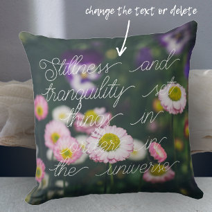 Pink daisies and pansies in the green garden cushion