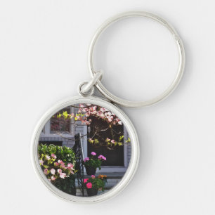Pink Dogwood and Pots of Geraniums Key Ring