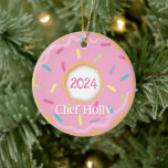 Pink Doughnut Chef, Cook or Baker Christmas Ceramic Ornament<br><div class="desc">This design features our cute pink doughnut with sprinkles, in a pink, purple and mint green colour scheme. Click the customise button if you would like to move/scale the images and further modify the text! Variations of this design, additional colours, as well as coordinating products are available in our shop,...</div>