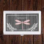 Pink Dragonfly Rustic Business Card Case<br><div class="desc">Keep your business cards on hand to pass out to potential clients or customers with a Pink Dragonfly Rustic Personalised Business Card Case. Case design features a vibrant dragonfly adorned with delicate foliage against a dark grey rustic wooden background. Additional gift items available with this design as well as a...</div>