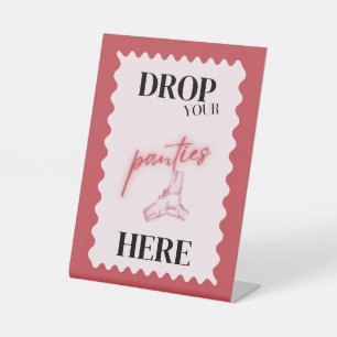 Pink drop your panties here game sign