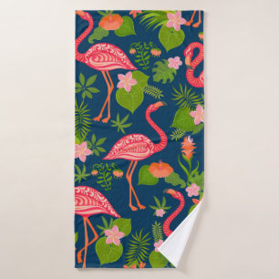 Pink flamingo ornament on a striped turquoise back bath towel