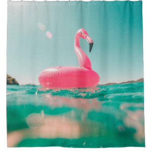 Pink flamingo swim ring on body of water in summer shower curtain