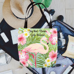 Pink Flamingo Tropical Flowers Girls Weekend Tote Bag<br><div class="desc">Tropical style tote bag design features a pink flamingo framed with a Hawaiian island style pattern of vibrant pink, yellow, and white hibiscus flowers and a green palm leaf background. Personalise the custom script text for your girls' weekend, name, or other preferred wording. Tote bag features the same design front...</div>