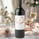 Pink floral wreath cross First Communion Wine Label<br><div class="desc">A white background,  decorated with watercolored pink and ivory flowers in a wreath and a golden cross. Personalize and add the name and date.</div>