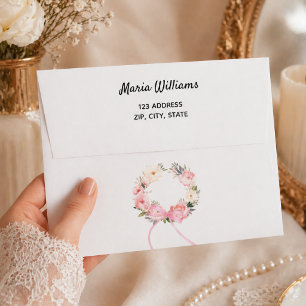 Pink floral wreath return address envelope