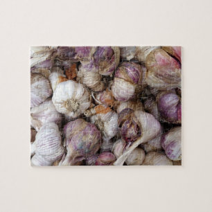 Pink garlic background with whole garlic bulbs jigsaw puzzle