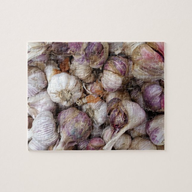 Pink garlic background with whole garlic bulbs jigsaw puzzle (Horizontal)