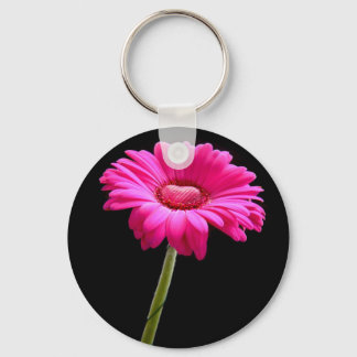 Pink gerbera with heart on black background key ring