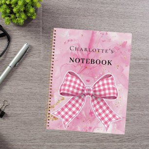 Pink gold bow notebook