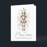 Pink & Gold Merry Christmas Nutcracker Card<br><div class="desc">Discover the elegance of holiday season with our Customisable Nutcracker Christmas Card. Immerse in the delicate watercolors of botanical imagery as a wooden nutcracker stands guard. The soft hues of pink gold and beige bring a cosy yet luxurious feel, making it a perfect choice to extend your heartfelt Merry Christmas...</div>