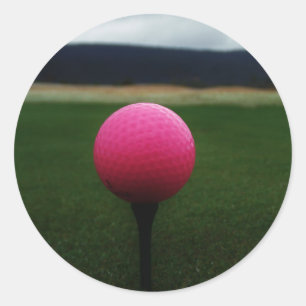 Pink Golf Ball on a mountain golf course Classic Round Sticker