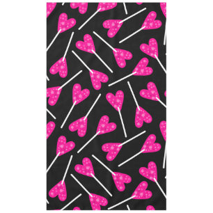 pink heart shape lollipop candy black tablecloth