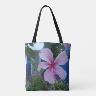 Pink hibiscus flower and blue beach cottage  tote bag