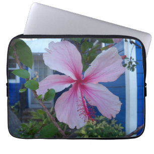 Pink hibiscus flower on a laptop sleeve