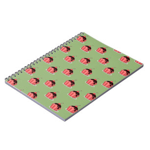Pink ice cream cups on green notebook