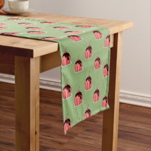 Pink ice cream cups on green short table runner