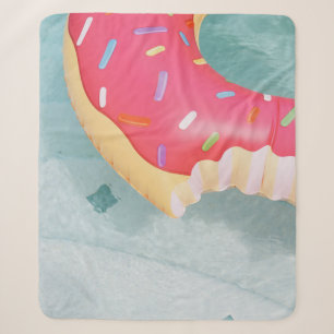 Pink inflatable doughnut floater sherpa blanket